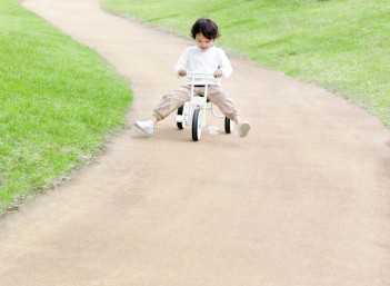 Boy on Tricycle